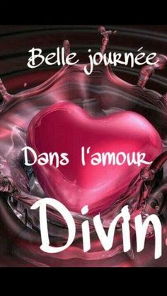 a red heart floating in water with the words,'d'annour divine