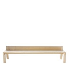 a wooden bench sitting on top of a white floor