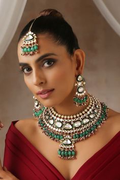 Gold toned geometric carved pendant necklace with green moissanite polki embellishment and bead drops. Comes with earrings and maangtikka. - Aza Fashions Green Moissanite, Carved Pendant, Jewellery Sets, Fashion App, Aza Fashion, Online Jewelry, Necklace Set, Gold Tones, Carving