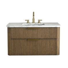 a bathroom vanity with two sinks and gold faucets on the top, against a white background