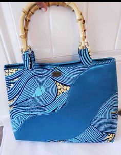 Ankara Fabric Wavy Handbag/blue Purse/african Handbag/top Handle African Fabric Bag/handmade African Purse/african Purse/ankara Purse/bag/l - Etsy Rectangular Bag With Bamboo Handle As Gift, Rectangular Bag With Bamboo Handle For Gift, Rectangular Bags With Bamboo Handle For Gift, Bamboo Handle Tote Bag As Gift, Bamboo Handle Tote Bag For Gift, Blue Handheld Shoulder Bag With Leather Handles, Blue Square Satchel As Gift, Blue Square Satchel For Gift, Handheld Shoulder Bag With Bamboo Handle As Gift