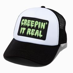 Claire's "Creepin' It Real" Glow in the Dark Trucker Hat Black Halloween Trucker Hat, Adjustable Halloween Hats For Streetwear, Black Snapback Trucker Hat For Halloween, Halloween Snapback Hat For Streetwear, Snapback Hats For Halloween Streetwear, Casual Halloween Trucker Hat Baseball Cap, Trendy Halloween Cap Hat, Casual Halloween Trucker Hat, Trendy Halloween Cap