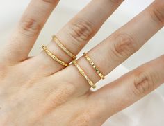 Make 'em admire your bling with this 4-stackable, Sterling Silver & Gold-plated Ring Set! Available from size 5-10. Featuring 4 different-style bands, this shimmery jewelry will have you winning the day with a ridiculously glam look. Show off your flashy style with these trendy rings!  FAQ: How many rings are included in the set?  -This set includes 4 rings.  Can the rings be worn individually or only as a set? -You can wear these rings together or separate. Are the rings made of real sterling silver and gold-plated? -These rings are 925 Sterling Silver and the gold set is 14k gold plating over sterling silver. Popular Rings, Sterling Silver Stacking Rings, Stacking Ring Set, Trendy Ring, Silver Stacking Rings, Gold Plated Rings, Minimalist Rings, Ring Set, Dainty Ring