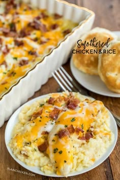 a white plate topped with mashed potatoes covered in cheese and bacon next to a casserole dish