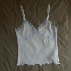 Super Cute Light Blue Tank Top With Periwinkle Lace Detailing From H&M In Size X-Small, Adjustable Straps And Lettuce Edge On Bottom Hem, Adorable Just Didn’t Fit Me, New Without Tags H&m Casual Cami Tank Top, Casual H&m Cami Tank Top, Fitted Light Blue Tops With Lace Trim, Fitted Light Blue Top With Lace Trim, H&m Spring Cami Tops, H&m Fitted Cami Tank Top, H&m Fitted Cami Top, H&m Tops For Summer Loungewear, H&m Summer Loungewear Tops