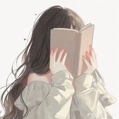 a girl is reading a book with her hands on her face and she has long hair