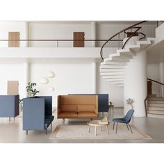 a living room filled with furniture next to a spiral stair case and white walls,