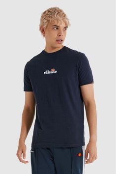 Made from 100% soft cotton, this standard fit tee has a ribbed collar and twin stitched cuffs. Finished with an embroidered Ellesse print to the chest, the signature woven tab on the sleeve and a large statement plastisol print to the back.  100% Cotton. Workout Tee, Next Uk, Cotton T Shirt, Cotton Tshirt, The Next, Online Shop, The 100, Collar, Mens Tshirts