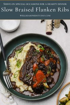 a green plate topped with steak and mashed potatoes