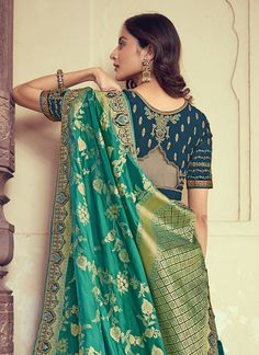 PRODUCT DESCRIPTION Banarasi Silk Lehenga choli in Grey This attire has Zari Weaving, Sequins, Thread & Cording Embroidery in it Designer Green Choli For Transitional Season, Designer Fitted Meenakari Choli, Transitional Season Green Choli, Designer Anarkali Choli With Meenakari, Anarkali Choli With Meenakari For Designer Wear, Green Meenakari Sharara, Transitional Season Green Choli With Cutdana, Semi-stitched Choli For Traditional Ceremonies During Diwali, Fitted Banarasi Silk Lehenga With Meenakari