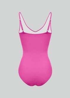 Discover elegance with our V-Neck leotard. Made from a smooth, stretchy blend of 85% nylon and 15% spandex, it features a deep V-neckline and adjustable straps for a perfect fit. Perfect for any occasion. Leotard with adjustable straps Low Cut Leg with Full Back Coverage Stretchy spandex 85% Nylon / 15% Spandex Imported Summer Nylon Leotard With Smoothing Details, Smoothing Nylon Leotard For Summer, Solid One-piece Leotard With Lined Body, Solid One-piece Lined Leotard, Solid One-piece Smoothing Leotard, Micro-elastic Leotard With Lined Body, Smoothing One-piece Leotard, Second-skin V-neck Swimwear, V-neck Swimming Bodysuit With Built-in Bra