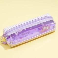 Bring along your pens using this super kawaii twin zipper pencil case. It features prints of Kuromi taking a nice nap! This pencil case has two compartments that you can use to organize things. Kawaii Pencil Case With Zipper Pouch For School, Kawaii Pencil Case With Zipper For School, Kawaii School Pencil Case With Zipper, Kawaii Pencil Case With Pen Holders For Students, Purple Zipper Pouch Pencil Case For School, Kawaii Rectangular Pencil Case With Zipper Closure, Kawaii Pencil Case With Pen Slots For School, Kawaii School Pencil Case With Pen Slots, Purple Rectangular Pencil Case For Students