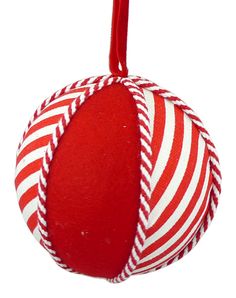 a red and white striped ball ornament hanging from a hook on a string