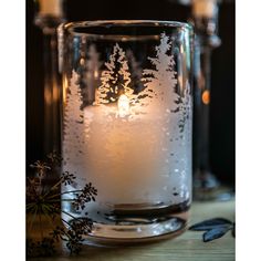 A lush thicket of Evergreens forms a treeline that speaks to the interconnected natural beauty below. These hardy trees are a symbol of our home state, and a reminder of resilience for all seasons. Here, we’ve etched a forest onto a simple cylindrical shape. Illuminate from within with a pillar candle, or add it as an accent to your Evergreen grove. Occasional Chairs Living Room, Simon Pearce, Summer Furniture, Modern Rug Design, Selling Candles, Outdoor Table Lamps, Chic Christmas, Linen Spray, Pottery Pieces