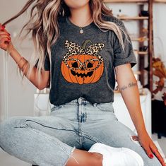 TigerCoDesigns Leopard Pumpkin Shirt, Fall Pumpkin Shirt, Pumpkin Lover Shirt, Funny Halloween, Halloween Shirt, Thanksgiving Shirt, Autumn TShirt This customized gift can be used by all the members of family, it will be the best wanderlust, travel apparel unisex personalized shirt ever! 👉 Product Details:The T-Shirts, Hoodies, Youth, Toddler and Baby Suits(onesie) are unisex.👈 👉Reading the Sizing Chart: Please note that the sizing chart includes the measurements of one side of the shirt, not Horror Themed Short Sleeve T-shirt For Fall, Fun Halloween Short Sleeve Shirt, Casual Short Sleeve Tops For Costume Party, Casual Halloween Shirt For Costume Party, Casual Halloween Costume Party Shirt, Spooky Short Sleeve Shirt For Fall, Spooky Short-sleeve Fall Shirt, Funny Orange Tops For Fall, Funny Orange Top For Fall