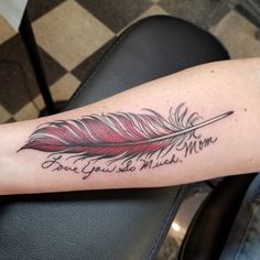 a woman's arm with a feather tattoo on it that says, but you're