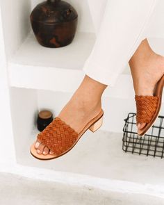 Santorini Woven Mule - Cognac – Liberté Leather Summer Leather Mules With Intrecciato Weave, Chic Woven Leather Mules With Open Heel, Spring Woven Leather Mules With Block Heel, Casual Intrecciato Weave Mules For Summer, Casual Open Toe Woven Leather Clogs, Leather Open Toe Mules With Woven Sole, Summer Textured Sole Almond Toe Mules, Summer Woven Leather Mules, Summer Leather Mules With Woven Detail