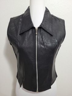 NEW IDENTITY Women's Vest Jacket Sleeveless Zipper Front 100% Leather.Size M. Condition is Pre-owned. Shipped with USPS Priority Mail. Beautiful Vest Jacket,in good condition for use.  Look at the pictures for more details.(28) Measurements: Armpit to armpit- 17.5'' Length from shoulder to bottom: 18.5" Shoulder to shoulder- 14.5" □♡□♡□♡□♡□♡□♡□♡□♡□♡□♡□♡□♡□♡□♡□♡□ At ShopWithSay we have a commitment, make your purchase a pleasant experience. In our store you will find a wide variety of products th Sleeveless Vest Biker Jacket For Fall, Sleeveless Biker Jacket Vest For Fall, Fall Leather Sleeveless Jacket, Casual Fitted Leather Vest, Sleeveless Biker Vest For Fall, Fitted Leather Casual Vest, Fitted Vest With Zipper Closure For Fall, Sleeveless Biker Outerwear For Spring, Biker Vest With Zipper Closure For Fall