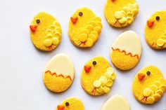 decorated cookies in the shape of chickens and eggs on a white background with text overlay