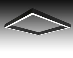 a black and white photo of a square light fixture on a gray background with the lights turned off