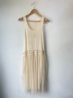 Vintage Drop Waist Ballerina Dress. Super soft and stretchy on top with pleated tulle over a shiny layer on bottom. Two ties on the side can be left open or tied into a bow. The whole dress is a bit sheer making it super sexy. Approximate measurements:Underarm to underarm: 15" Length: 44" Summer Sleeveless Tulle Midi Dress, Summer Maxi Dress With Tulle Skirt, Summer Mesh Dress With Tulle Skirt, Chic Tulle Midi Dress For Summer, Casual Summer Dress With Tulle Skirt, Summer Casual Tulle Dress, Chic Mesh Summer Dresses, Chic Mesh Dresses For Summer, Chic Summer Mesh Dresses