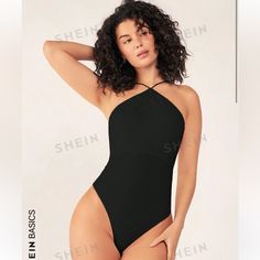 This Is A Nwt Sleeveless, Backless Halter Bodysuit. It Is Black, Size Small, And Is Made From 91% Polyester And 9% Elastane. Sleeveless Seamless Bodysuit For Beach, Sleeveless Seamless Party Bodysuit, Seamless Sleeveless Party Bodysuit, Seamless Sleeveless Bodysuit For The Beach, Chic Seamless Sleeveless Swimwear, Seamless One-piece Tank Top, Sleeveless Swimwear For Night Out, Sleeveless Stretch Bodysuit For Beachwear, Sleeveless Stretch Beachwear Bodysuit