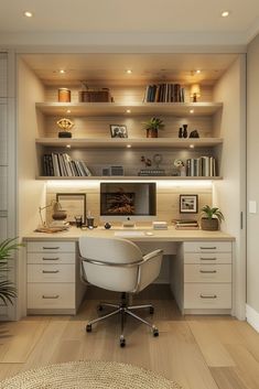 a home office with built - in shelving and desk