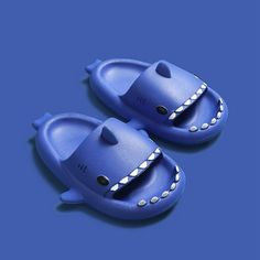 Are you seeking for a soft and comfortable slipper? These Shark Shaped Summer Slippers are perfect for both men and women. These slippers are made of a long-lasting material that is ideal for relaxing about the house. You'll feel as though you're walking on air because to the smooth sole. Features: Season : Summer Heel shape : flat heels Design type : cartoon animation Lining material : Synthetic Fits true to size, take your normal size Material superior: Synthetic Sharks For Kids, Shark Slippers, Soft Sandals, Sharks Funny, Rainbow Shoes, Comfy Slippers, Cute Shark, Comfortable Slippers, Cute Flats