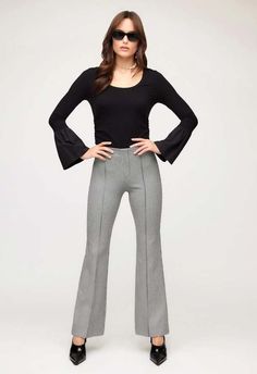 Sizes xs s  color: houndstooth  full length pant  pintuck detail  elasticized waistband with faux fly detail  54% viscose 41% cotton 5% spandex  dry clean only  by fifteen twenty    product measurements for size s:  front rise: 9 1/2 in  inseam: 32 1/4in    model is wearing size s Fall Houndstooth Trousers, High Waist Houndstooth Pants For Fall, Fall Business Casual Houndstooth Bottoms, Fall Business Casual Elastane Dress Pants, Fitted Houndstooth Pants For Fall, Fall High-waisted Houndstooth Pants, Elegant Houndstooth Pants For Spring, Elegant Spring Pants With Houndstooth Pattern, Fall Houndstooth High-waisted Pants