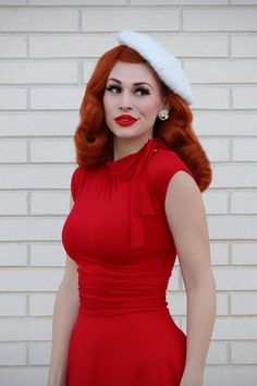 This bombshell features figure-flattering shirring detail on the waist and hidden side pockets (OMG!). Get yours now! Pinup Dress Outfit, Bombshell Dress, Pinup Style, Patch Dress, Paris Chic, Lipstick Red, Retro Clothing, Gala Dresses, Red Colour