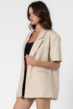 Half length sleeves Classic lapel collar One-button closure Single breast pocket Back vent Lined Fits oversized. Model measurements: Height 5'9", Bust 30.5", Waist 23.5", Hips 33.5" | Wearing a S/M. 85% Linen, 15% Cotton | Lining : 100% Polyester Linen Blazer, Short Jumpsuit, Lapel Collar, Model Measurements, Single Breasted, Sofia, Jumpsuit Romper, Sweater Dress, Length Sleeve