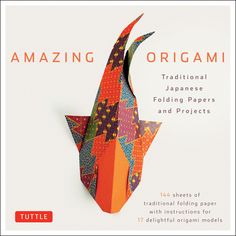 an origami fish made out of paper and folded in different colors, with the title'amazing origami traditional japanese folding papers and projects '