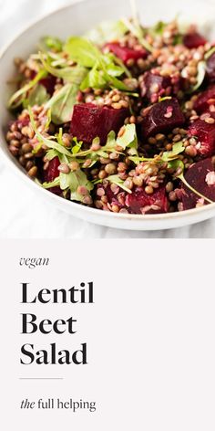 a white bowl filled with beet salad on top of a table