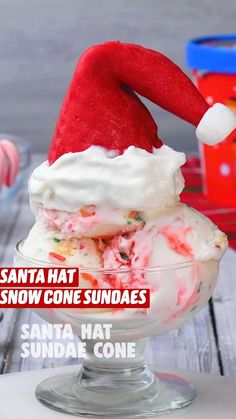 a santa hat ice cream sundae in a glass bowl