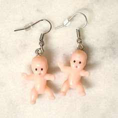 Plastic Baby Crafts, Gag Earrings, Weird Earrings Aesthetic, Weird Core Earrings, Plastic Baby Earrings, Wierdcore Earrings, Tiny Plastic Babies, Plastic Babies, Fake Baby