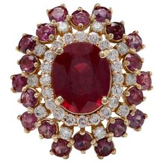 9.57 Carats Impressive Natural Red Ruby and Diamond 14K Yellow Gold Ring Total Red Ruby Weight is: Approx. 8.47 Carats Center Ruby Weight is: Approx. 5.47 Carats Center Ruby Treatment: Lead Glass Filling Center Ruby Measures: Approx. 11.00 x 9.00mm Total side rubies weight is: 3.00 Carats (Heat Only) Natural Round Diamonds Weight: 1.10 Carats (color G-H / Clarity SI1-SI2) Ring size: 7 (we offer free re-sizing upon request) Ring total weight: Approx. 11.8 grams Disclaimer: all weights, measurements and colors are approximate and may vary slightly from the listed dimensions or as seen in the image. All pictures are magnified to show the smallest of details. Please, refer to the item description for actual weight and size evaluation. SKU #VR55 Lead Glass, Natural Ruby Ring, Diamond Jewelry Necklace, Yellow Gold Engagement Rings, Ruby Jewelry, Leaded Glass, Pretty Rings, Ruby Gemstone, Red Ruby