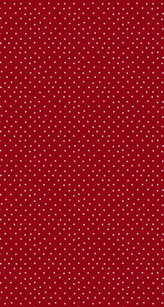 a red background with white polka dots