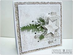 a christmas card with music notes and a star