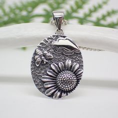 Sterling Silver Sunflower Bee Scene Charm Hypoallergenic Silver Jewelry With Flower Pendant, Hypoallergenic Silver Flower Pendant Jewelry, Silver Oval Jewelry With Flower Charm, Everyday Silver Flower-shaped Jewelry, Silver Flower Jewelry For Everyday Wear, Silver Sunflower Necklace For Mother's Day, Silver Sunflower Design Necklace For Gift, Silver Necklace With Sunflower Design For Gift, Silver Sunflower Pendant Jewelry