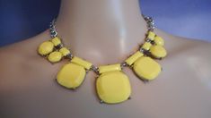 Acrylic yellow cluster necklace. Yellow necklace/choker; adjustable to your liking. Abstract and unique. Thick, heavier quality.  Yellow is complimented with a silver chain; adjustable. Sturdy and thick. Clean. No issues. Ready to wear. Necklace measures: 21 inches long, 1 1/2 inch long pendant in middle. https://vintagethisexit.etsy.com 60's Costume, Yellow Necklace, Cluster Necklace, Mod Fashion, Necklace Choker, Long Pendant, Choker Necklaces, Bib Necklace, Space Age