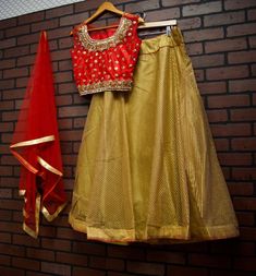 *Net Dupatta with gold border *Skirt with Full Gold Embroidery *Gold Beading on Blouse *Readymade Lehenga Choli/Crop Top Set *Size: Blouse Bust: 40 inches (+ 2 inch margin) Waist: 36 inches (+2 inch margin) Skirt length: 41 inches Skirt waist: 37 inches *Color May Vary Slightly From Picture *Our store is located in Los Angeles Red Lehenga With Gold Embroidery For Festivals, Red Lehenga With Gold Embroidery For Reception, Traditional Lehenga With Gold Embroidery For Reception, Festive Brocade Dupatta With Gold Embroidery, Red Lehenga With Gold Embroidery For Wedding, Reception Traditional Drape Choli With Gold Embroidery, Festive Choli With Gold Embroidery For Reception, Festive Gold Embroidered Brocade Dupatta, Festive Gold Embroidered Choli For Reception