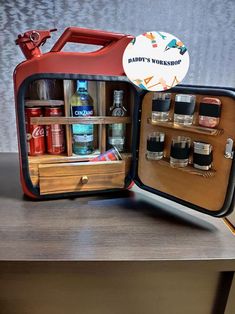 an open lunchbox sitting on top of a wooden table