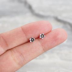 Tiny Jasmine Flower stud Earrings (1 pair) ✦ Dimension Size: 4.2 mm ✦ Material : 925 sterling silver, Hypoallergic Nickle free and Lead free (Good for sensitive ear skin) ✦ It's completely natural for sterling silver to oxidize over time when it's exposed to air. After each wear, use sterling polishing cloth to make them shine like new again and Please keep them in Box or Ziplock bags! ✦ We accept credit and debit card transactions, some bank transfer services, PayPal, Etsy Gift Card, Etsy Credits, Etsy Coupons, Apple Pay, Google Pay ✦✦ Shipping: We ship the package from Thailand ✦✦ USA: We ship with USPS with tracking number, it takes about 10-15 days. The tracking will be update when it reach to USA, No update between transit from Thailand to USA. Other countries: We ship with Thailand p Jasmine Flower, Flower Stud Earrings, Tiny Earrings, Flower Stud, Sterling Silver Flowers, Flower Earrings Studs, Flower Studs, Earrings Photo, Silver Flowers