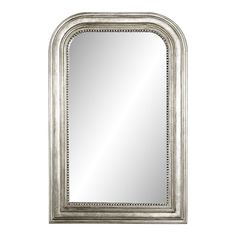 a silver framed mirror on a white wall