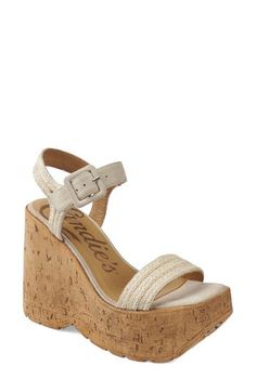 A cork-textured platform-wedge sole amplifies the earthy vibes of an outfit-making sandal topped with a woven ankle strap. 5" heel; 2" platform Adjustable ankle strap with buckle closure; hidden elastic inset Textile upper/leather lining/synthetic sole Imported Cork Platform Sandals For Summer, Summer Platform Cork Sandals, Summer Cork Platform Sandals, Summer Cork Wedge Heels, Spring Beach Wedge Sandals With Cork Material, Summer Open Toe Cork Wedge Sandals, Summer Cork Wedge Sandals With Open Toe, Spring Beach Cork Wedge Sandals, Cork Wedge Heel Sandals For Summer