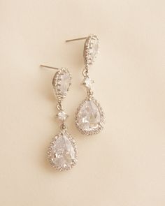 Material: - 925 silver - rhodium-plated brass - Zirconia stones. If you have a question, please click the "Message Seller" button below the item description. I will get back to you within 24 hours. Your Pearl and Crystal You can find more earrings here: https://www.etsy.com/de/shop/PearlandCrystal?ref=seller-platform-mcnav§ion_id=24180858 You can find more earrings with pearls here: https://www.etsy.com/de/shop/PearlandCrystal?ref=seller-platform-mcnav§ion_id=24193283 You can find more jewelry h Wedding Bridal Jewellery, Jewelry Bridal, Earrings Wedding, Pretty Earrings, Jewelry Wedding, Bridal Earrings, Rhodium Plated, Wedding Bridal, Bridal Jewelry