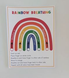 the rainbow breathing poster is hanging on the wall