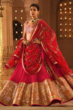 Pink lehenga with gota patti work embroidered and side tassel tie-up. Paired with embroidered blouse and dupatta.
Components:3
Embroidered
Neckline:Sweetheart
Sleeve Length:Cap
Fabric:Georgette
Color:Pink

Back tassel tie-up
Gota patti work - Aza Fashions Royal Family Portraits Painting, Family Portraits Painting, Embroidered Bridal Lehenga, Shantanu And Nikhil, Latest Bridal Lehenga Designs, Indian Wedding Clothes, Portraits Painting, Raw Silk Lehenga, Bridal Lehenga Designs