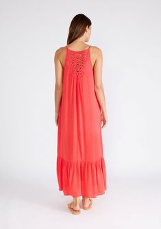 An ultra-flowy sleeveless spring maxi tank dress with a sheer lace racerback detail. Relaxed, flowy fit Sleeveless Maxi length Tiered skirt Scoop neckline Spaghetti straps Sheer lace racerback detail Side pockets Flowy bohemian maxi dress From the beach to the streets, our flowy bohemian maxi dress will keep you comfortable and chic all spring and summer long. With a long tiered skirt, spaghetti straps, and a sheer lace detail at the back. Model is 5'9, wearing a size S.Style: I-73422W-SBN Casual Maxi Dress With Lace Trim, Sundress Style Maxi Dress With Lace Trim, Sleeveless Summer Beach Dress With Lace Trim, Breezy Flowy Maxi Dress With Spaghetti Straps, Vacation Maxi Dress With Lace Trim, Bohemian Maxi Dress With Spaghetti Straps And Lace Trim, Casual Maxi Dress With Lace Trim For Vacation, Rayon Maxi Dress With Spaghetti Straps For Beach, Summer Beach Dress With Lace Back