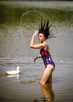 "Maxine of Hollywood 1980s vintage swimsuit Black base with neon pink, teal, orange and purple. Measurements: Taken lying flat before any stretch in the material 34\" bust 24\" waist 32\" hip" Body Floating In Water, Water Hair Flip Photography, Water Hair Flip, Colorful Swimsuit, Mermaid Floating In Water, Feather Slippers, Fun Non-slip Flip Flops For Swimming, Non-slip Fun Flip Flops For Swimming, Water Hair